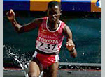 Uganda's Dorcas Inzukuru lands in the water on her way to Gold in Helsinki - Source IAAF TV